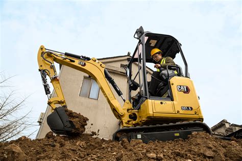 cat skid steer mini excavator package|cat mini hydraulic digger.